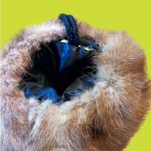 Vintage mink muff/clutch with zippered satin pocket. Excellent condition $75